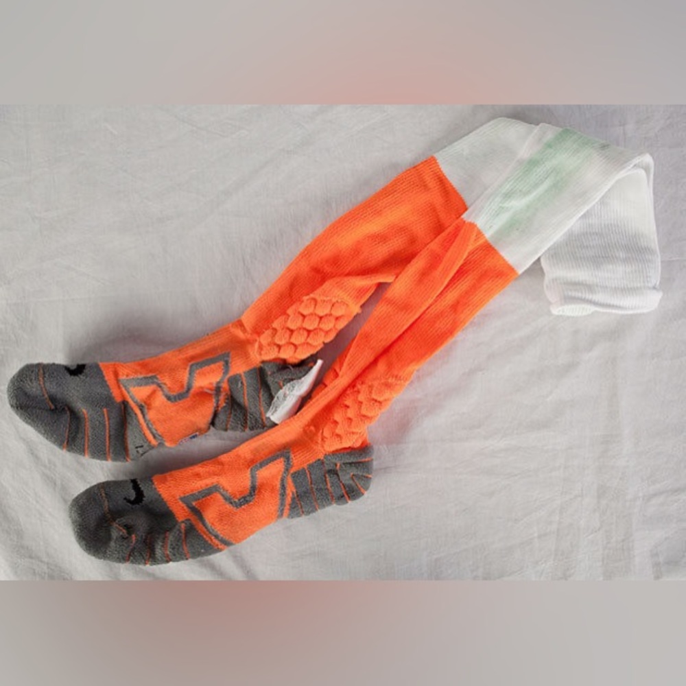 Used over the calf otc football socks, nfl official, size 10-13